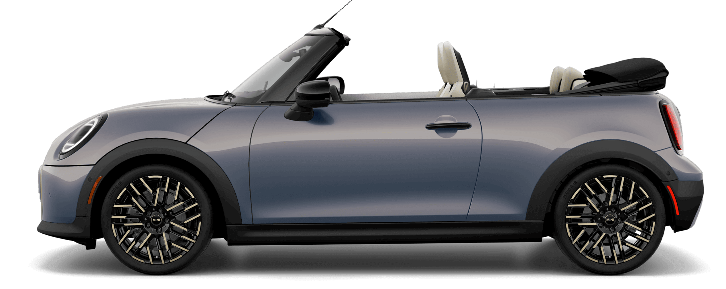 Side view of a 2025 MINI Cooper S Convertible in the Cooper grey Metallic body color, facing left with its shadow underneath it. 