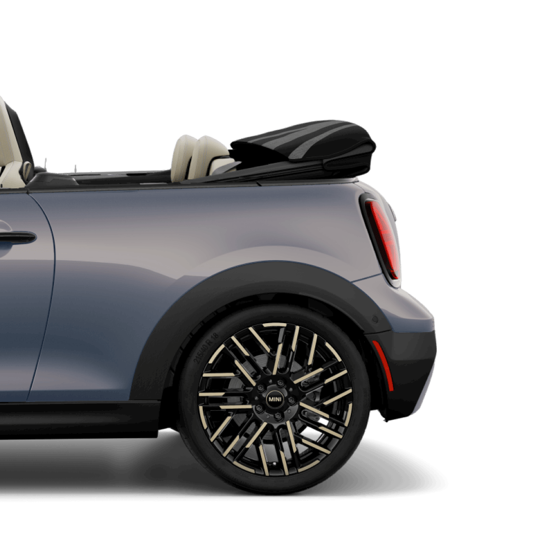 Side view of the rear half of a MINI Cooper Convertible.