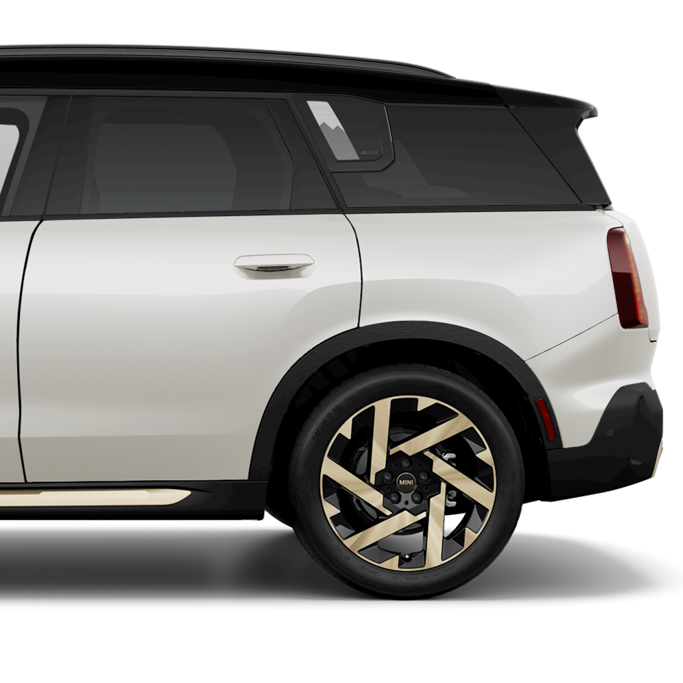 A side-view of a MINI Countryman SE ALL4 from the rear door to the trunk. 